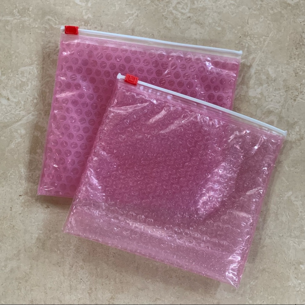 Glossier pink bubble makeup jewelry pouches